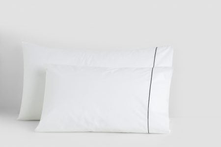 king vs. standard pillow cases in white with black piping