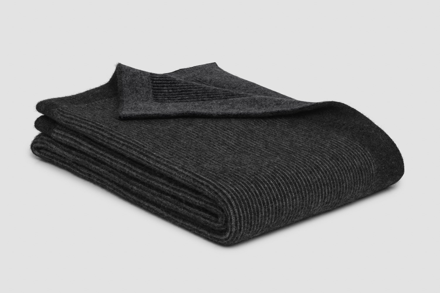 reversible rib throw in charcoal/grey colour