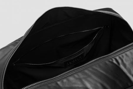 travel bag in black italian leather - pocket