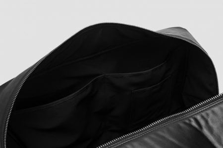 travel bag in black italian leather - pockets
