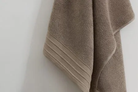 jacquard hand towel in mocha colour