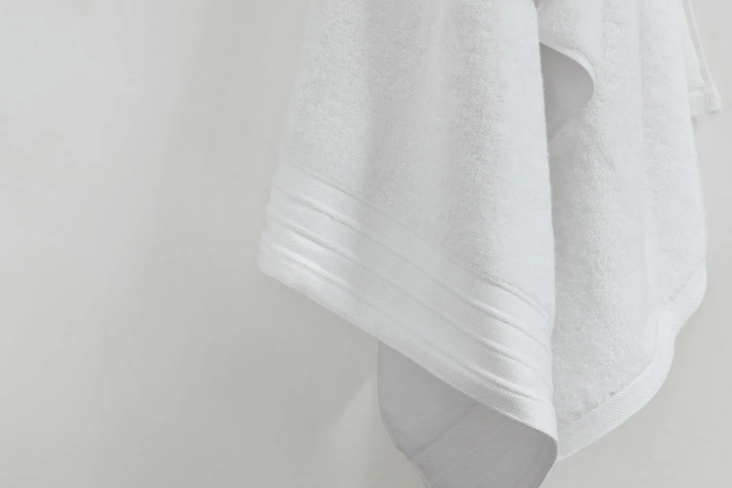 luxe hand towel in white colour