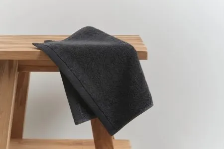 luxe face washer in charcoal colour